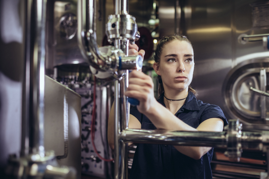 Woman pouring beer